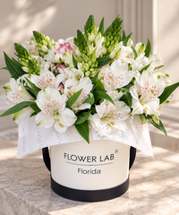Alina in a box with alstroemerias and mini roses