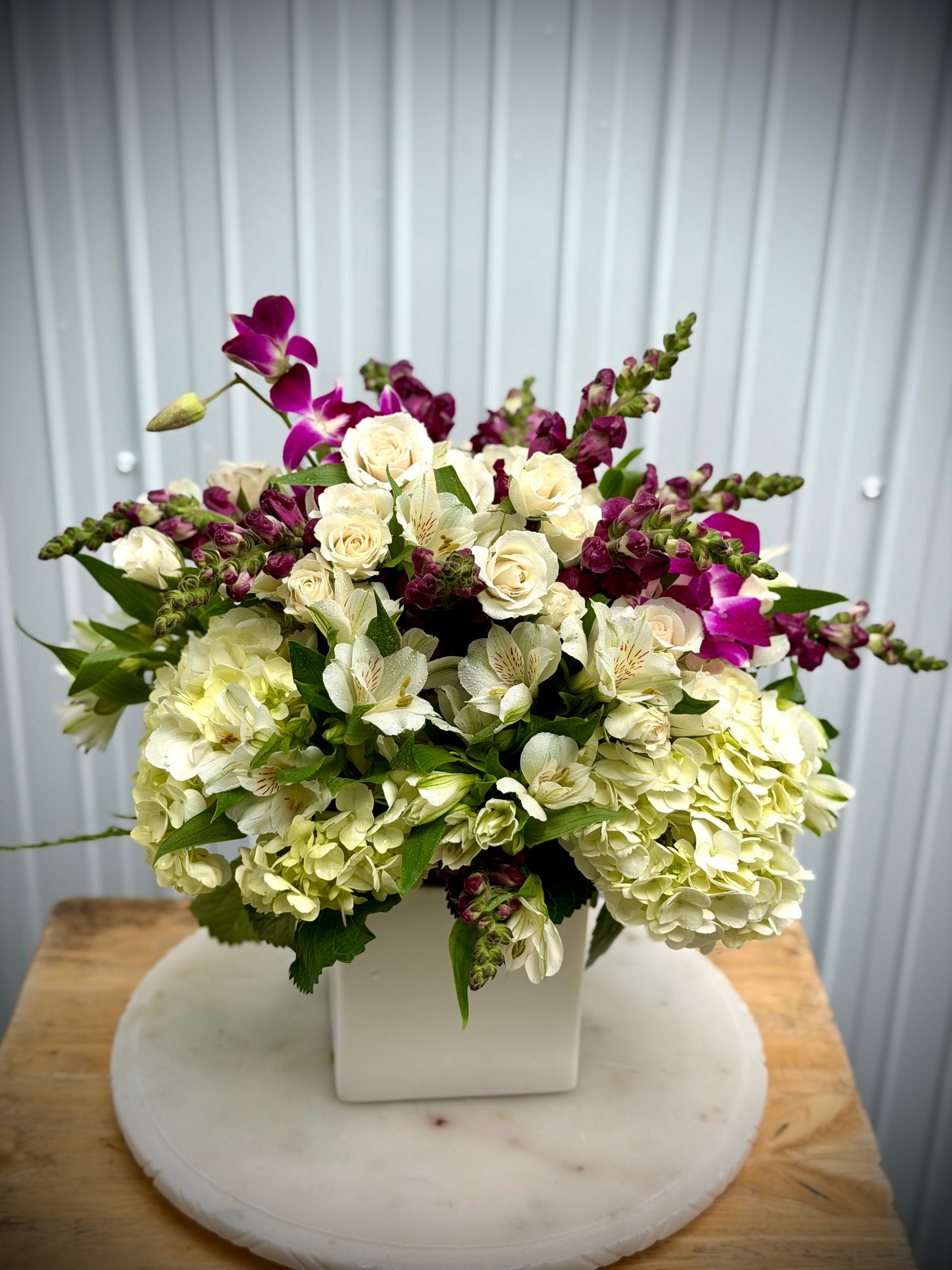 A1 Florist choice in a white ceramic vase