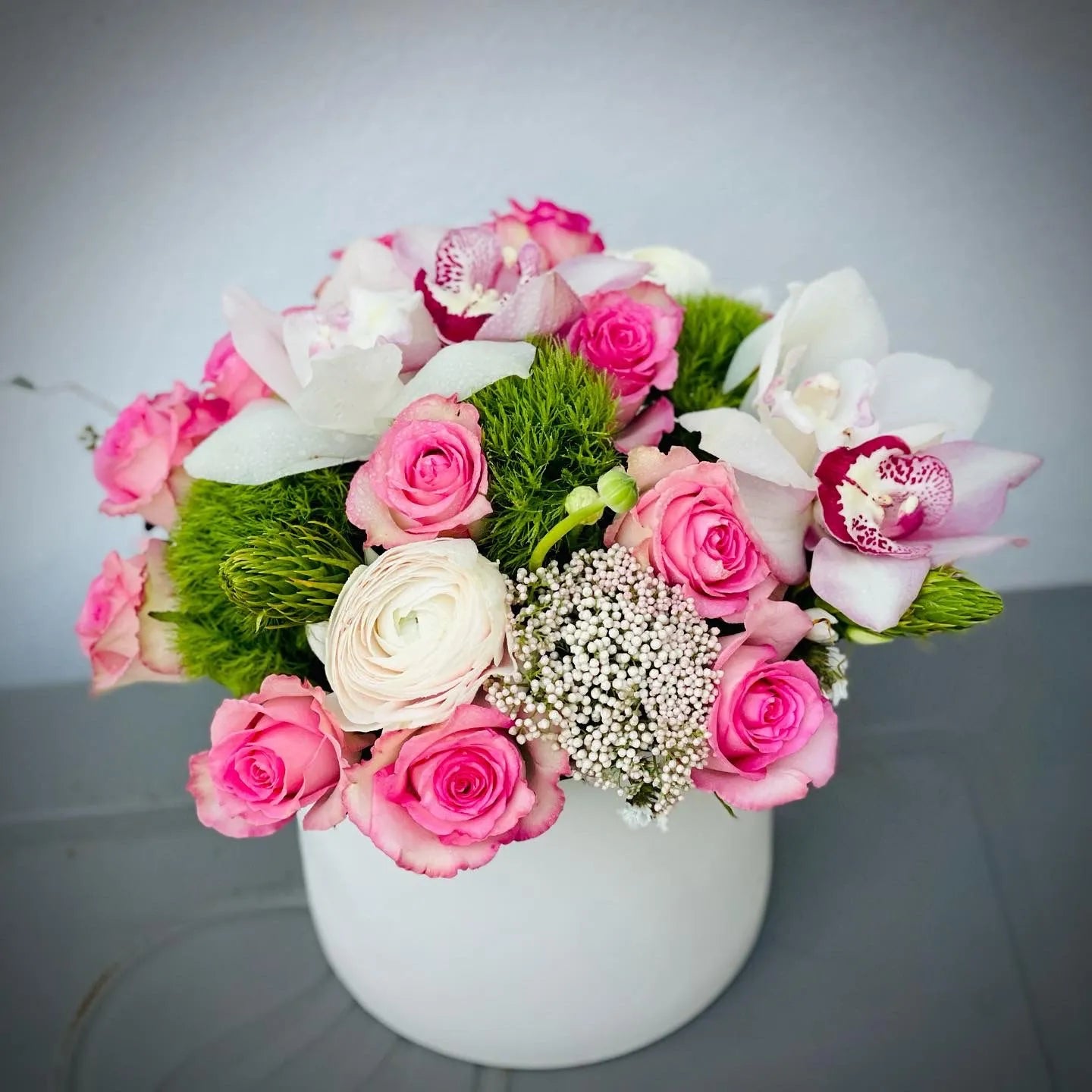 Florist Choice Flower Arrangement with Green Ball, Roses, Orchids