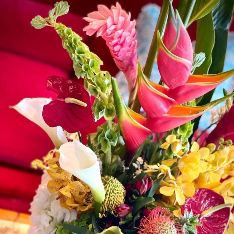 Tropical flower arrangement deals