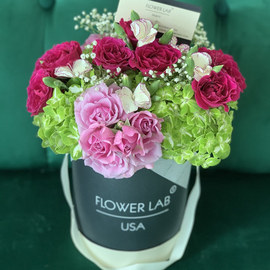 hydrangea, pink mini roses in a hat box