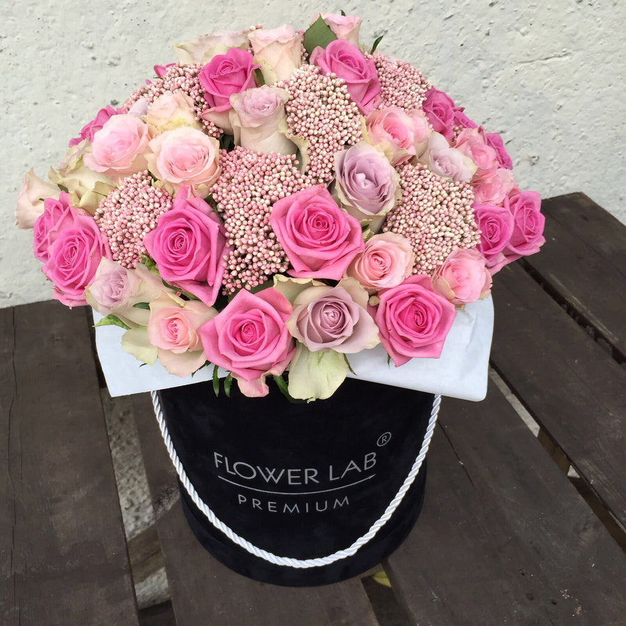 pink roses in a hatbox