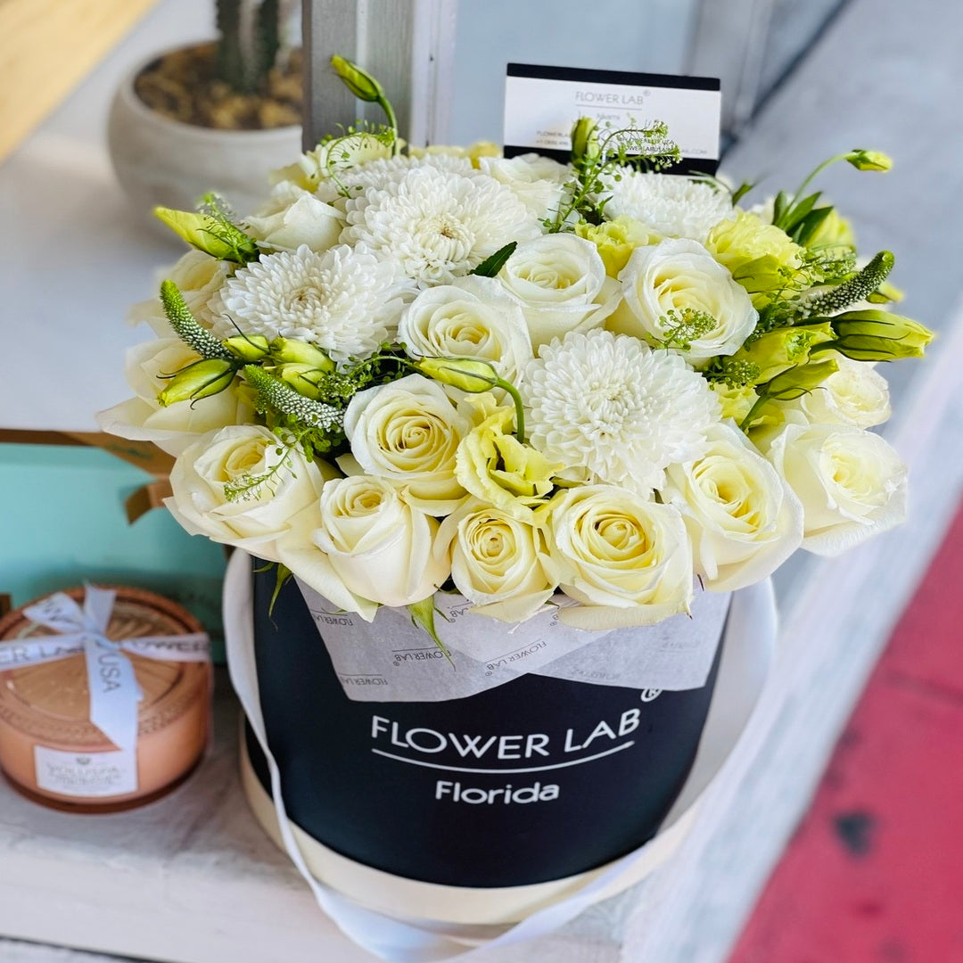 Sasha box with white roses, chrysanthemums and wax filler