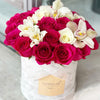 hot pink roses in a hat box
