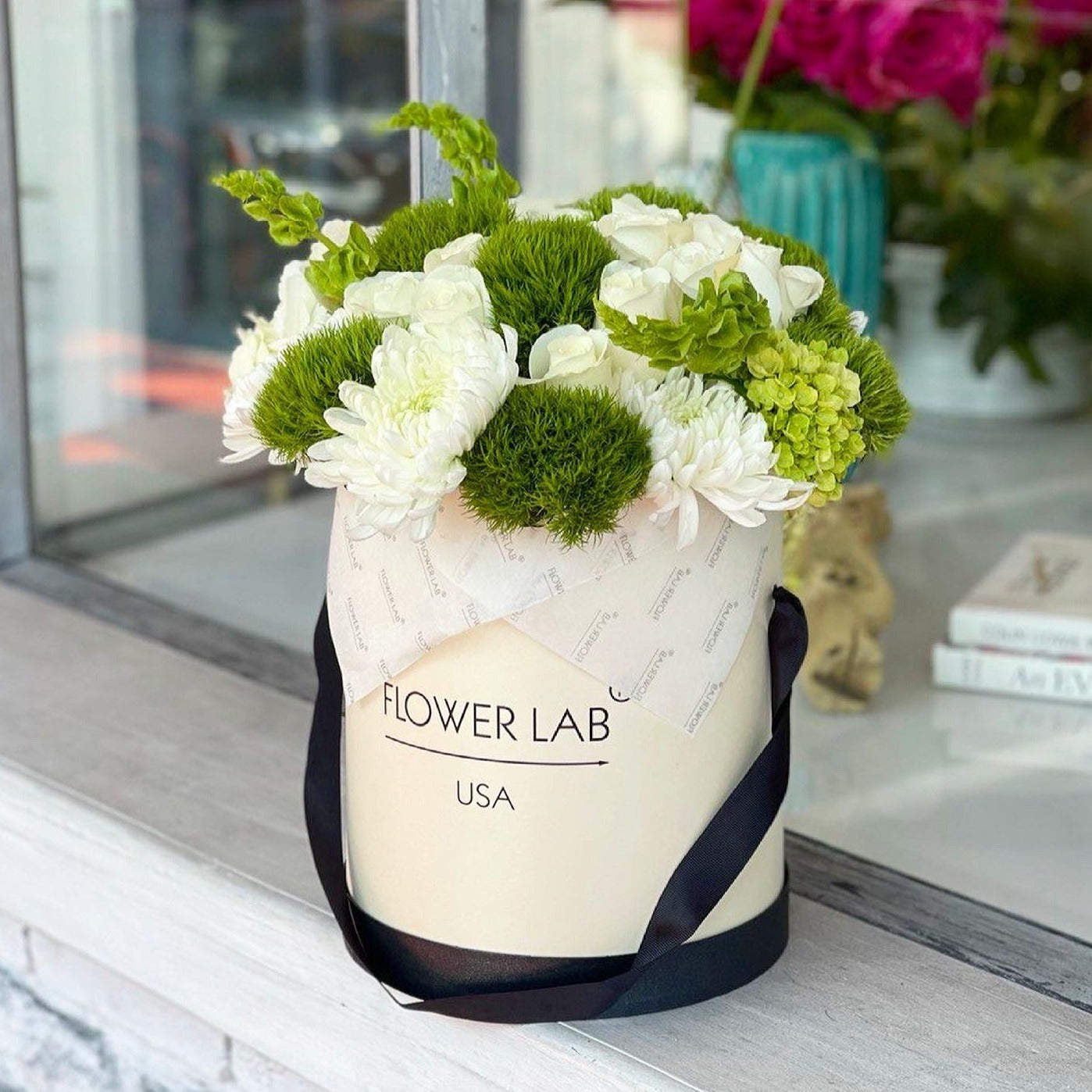 chrysanthemums, green ball in a box