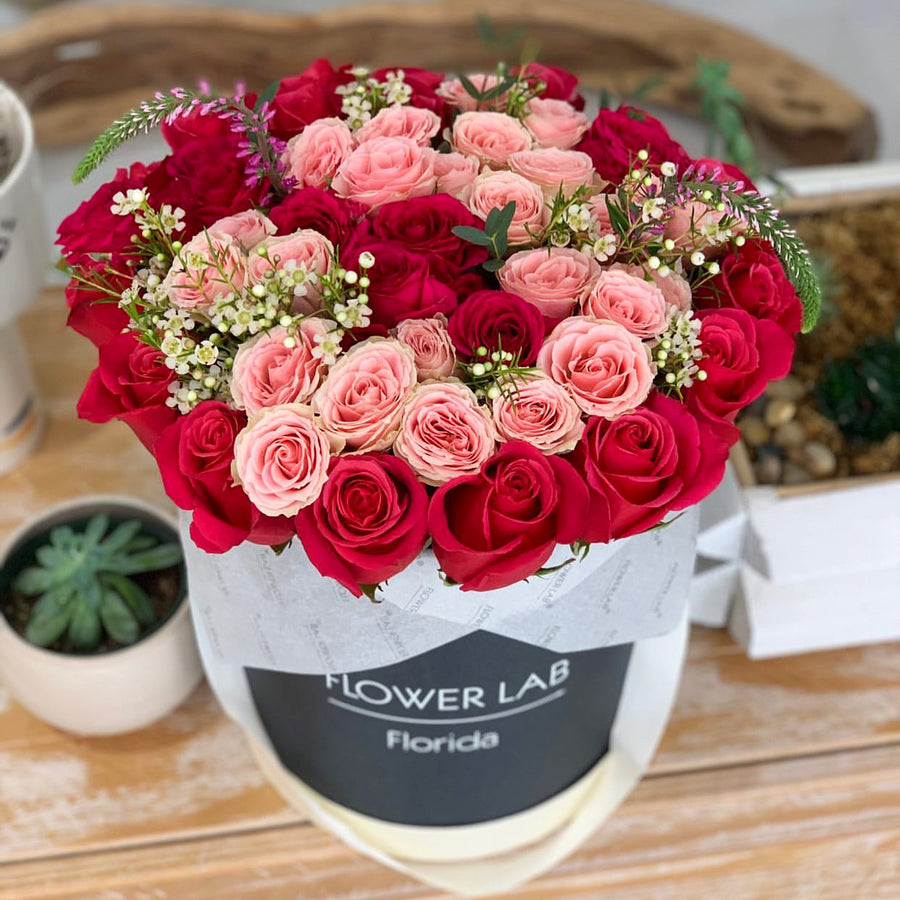 Tasha with red, pink roses