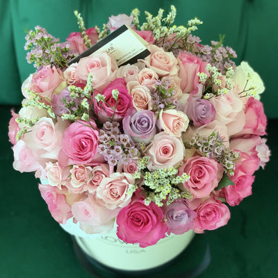 roses, wax flower in a hat box
