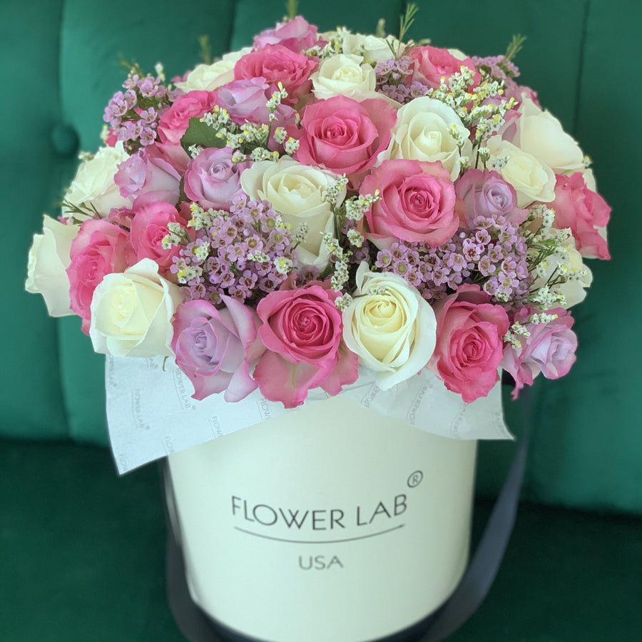 roses, wax flower in a hat box