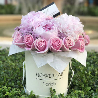 flowers in a box, pink roses, peonies. Bal Harbour florist