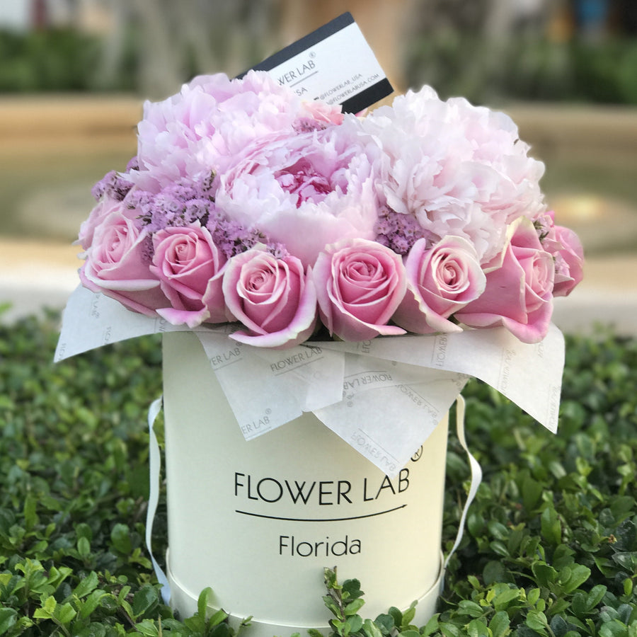 flowers in a box, pink roses, peonies. Bal Harbour florist 