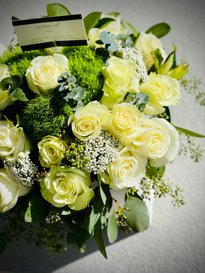 Earth tone flowers, whites and green roses. Best florist in bal harbour