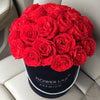 red roses in a box