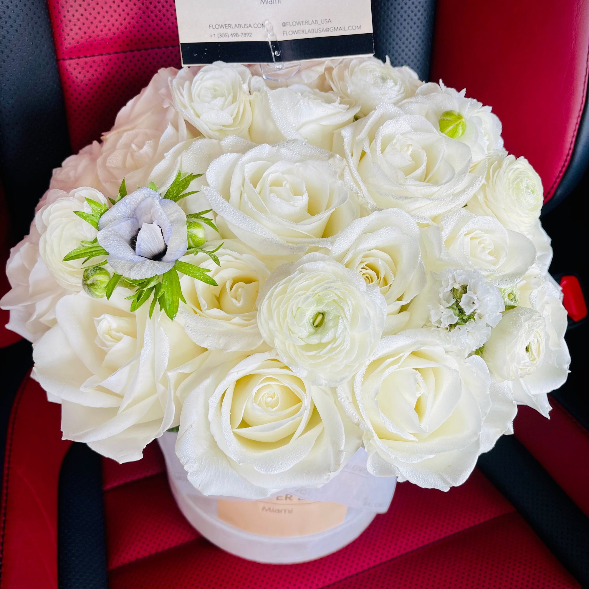 the best birthday flowers in bal harbour. white roses in a box.